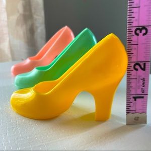 3 1950s plastic heels, pincushion